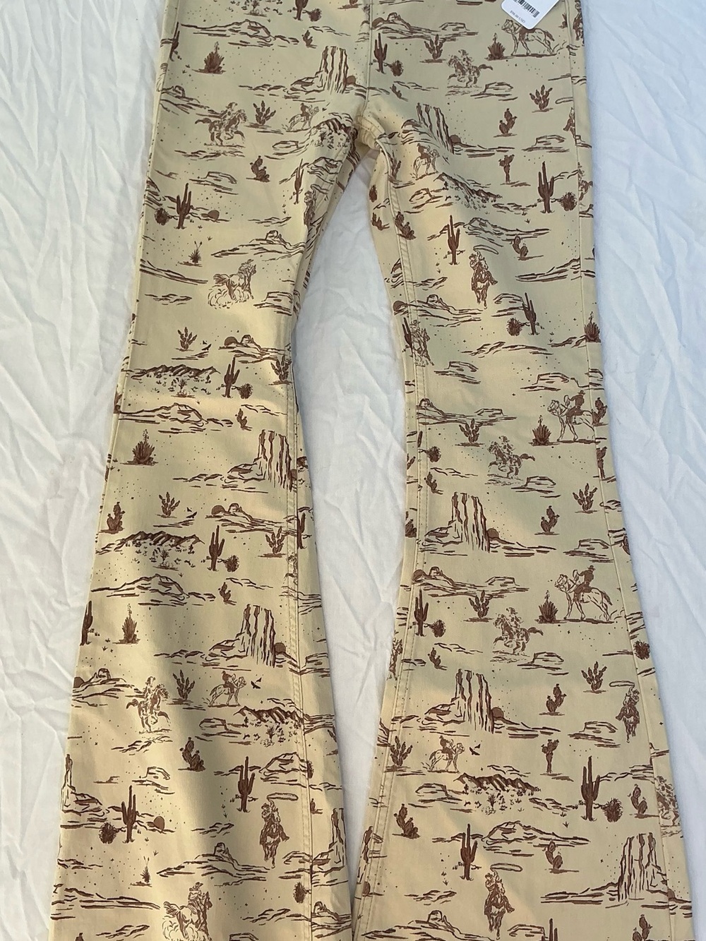 We The Free Beige Flare Pants with Brown Western Print